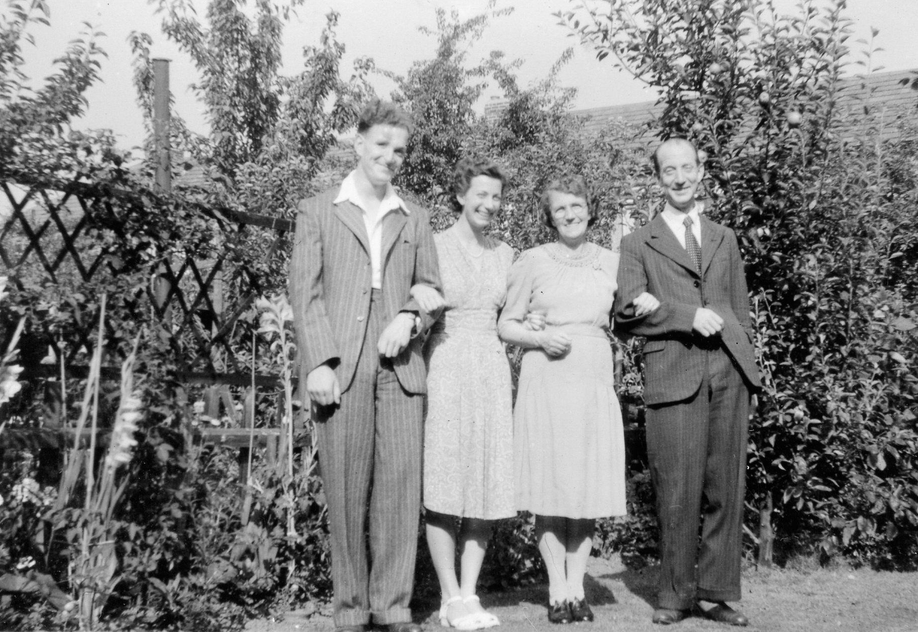 Leslie, Joan, Maud & Jim Lee in the garden at Enfield, September 1948
