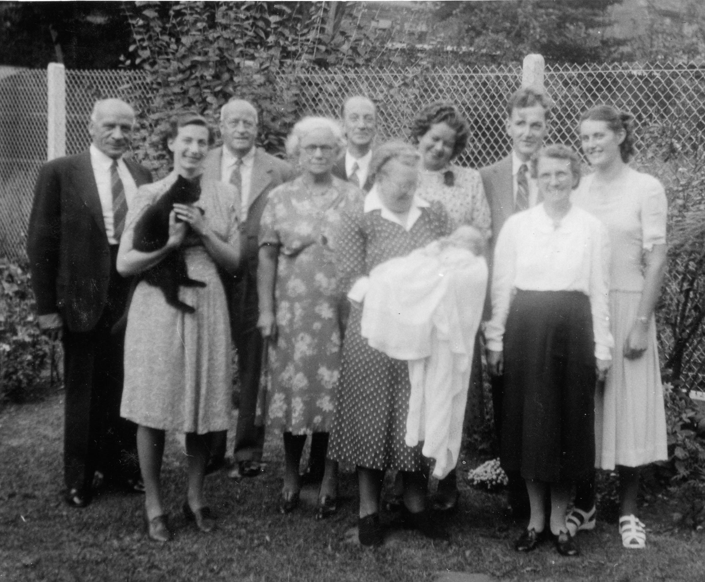 Paul Spurgeon's Christening 28 August 1949 at home (L to R): Walter, Joan (with Nicky), George & Sarah Spurgeon, Jim Lee, Nellie & Linda Spurgeon, Leslie, Maude & Marion Lee