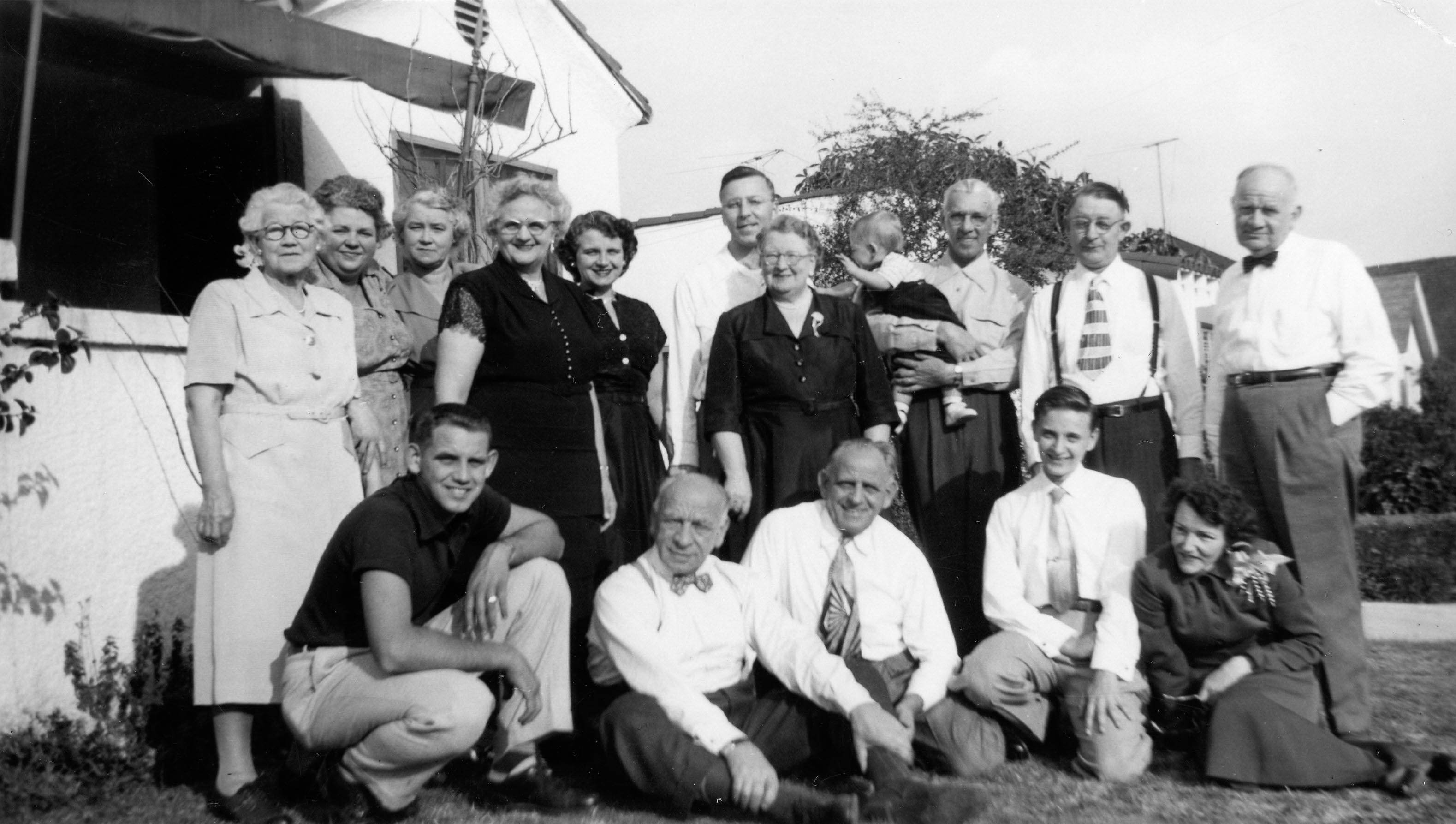 Spurgeon family in USA, Christmas 1952. Top row (L to R): Auntie Nellie's mother, Gladys Spurgeon, Auntie Nellie, Hilda Spurgeon, Jean & Jim Meyer, Nellie Spurgeon, Bruce Meyer, Jim Meyer's father, Otto Hammerschmidtt, Charles Spurgeon. Bottom row (L to R): Ed, Walter & Harold Spurgeon, Robert Hammerschmidtt, & a friend of Hilda & Otto