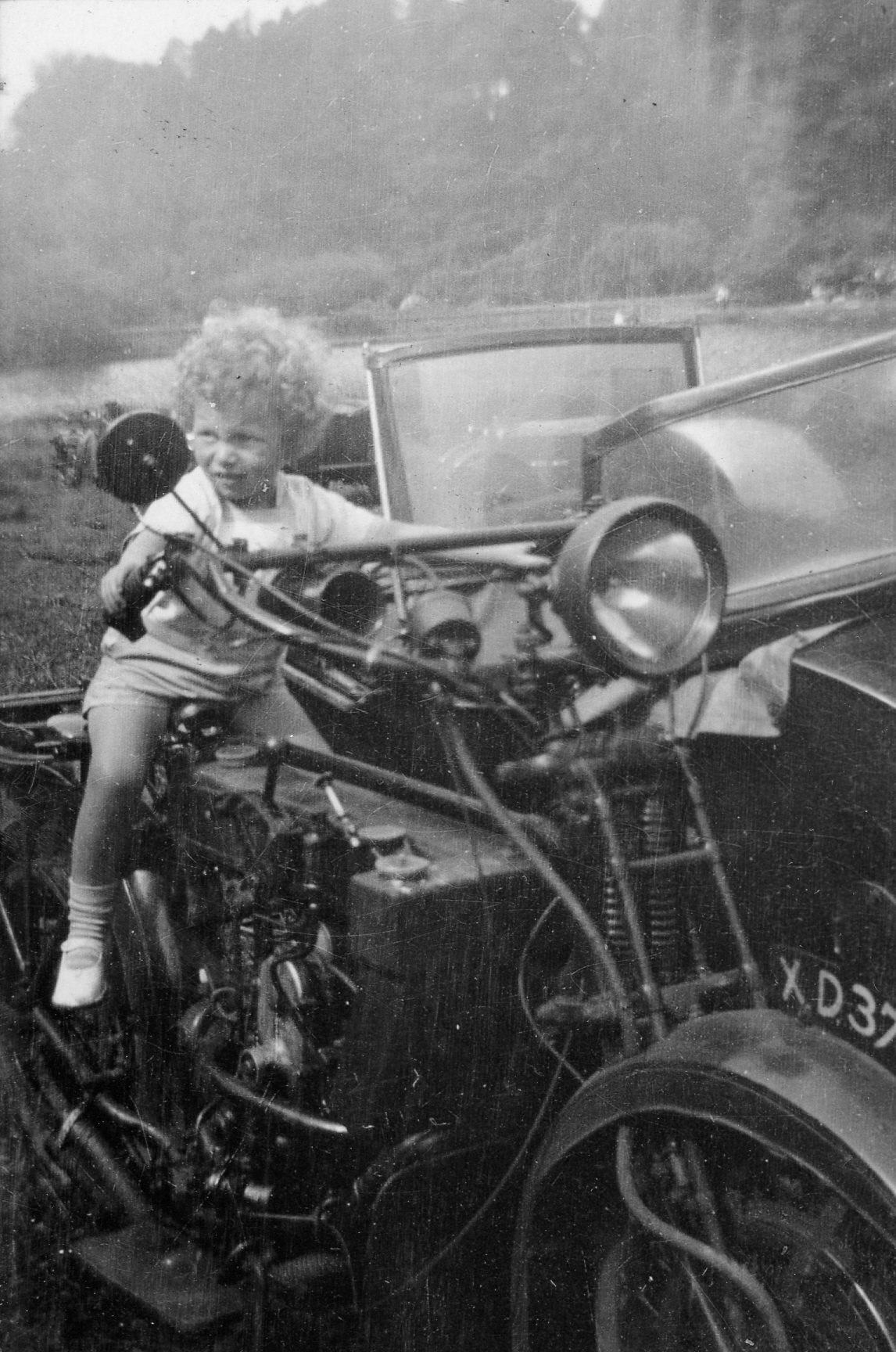 Roy Spurgeon on one of his father's motorbikes, Friday Street