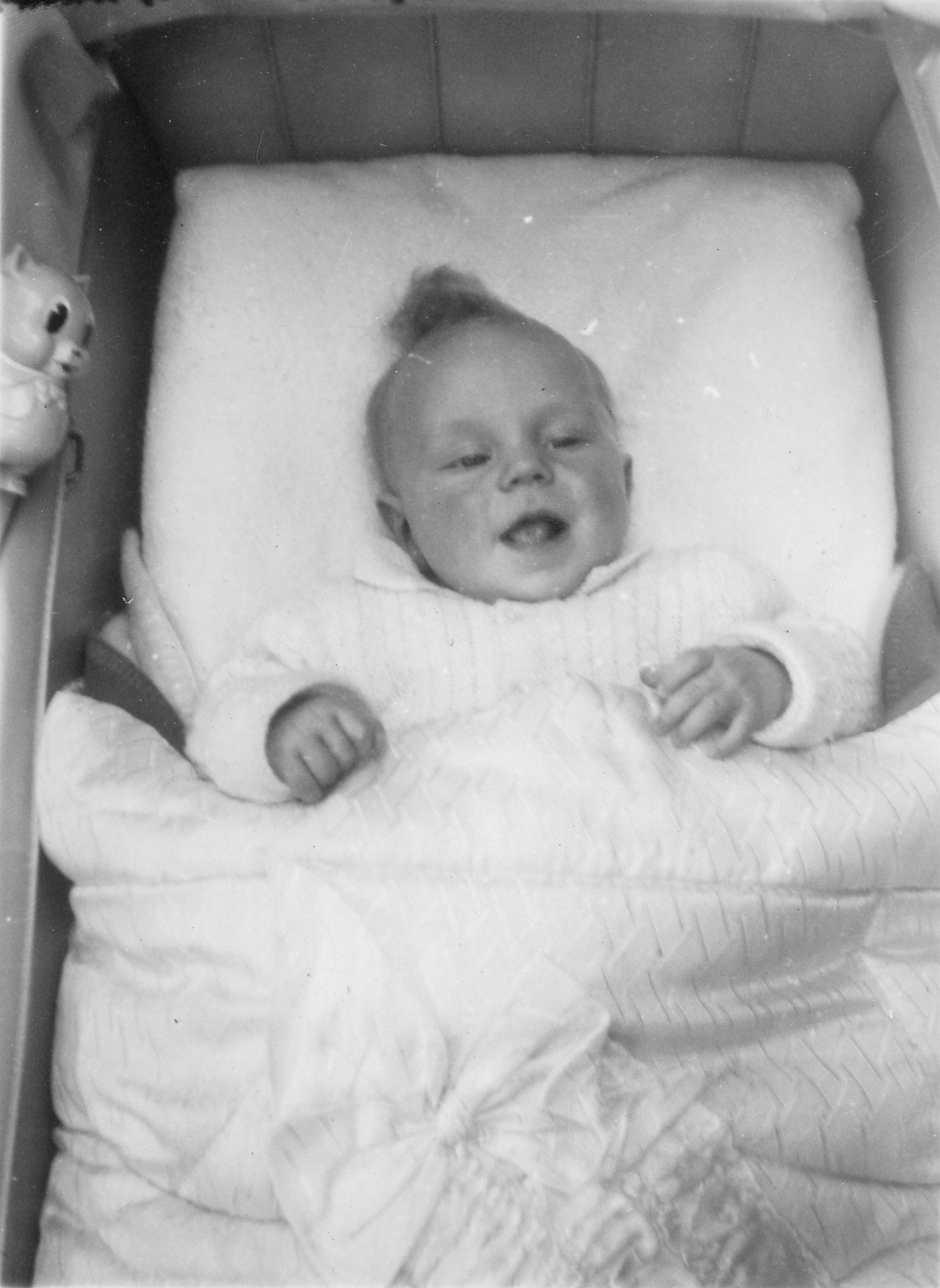 In his first pram set, at 3 1/2 months