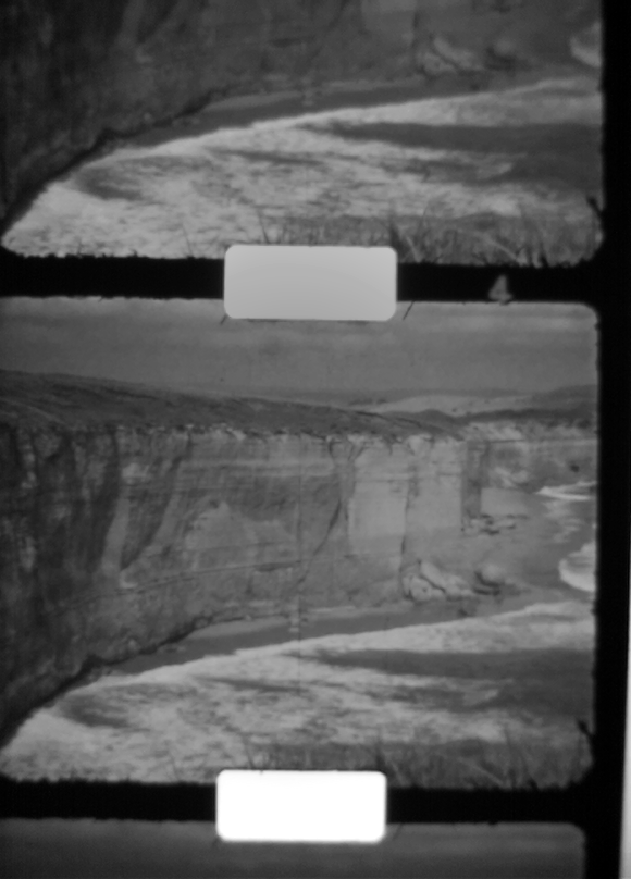 Gray scale image corrected for uneven diffused backlight