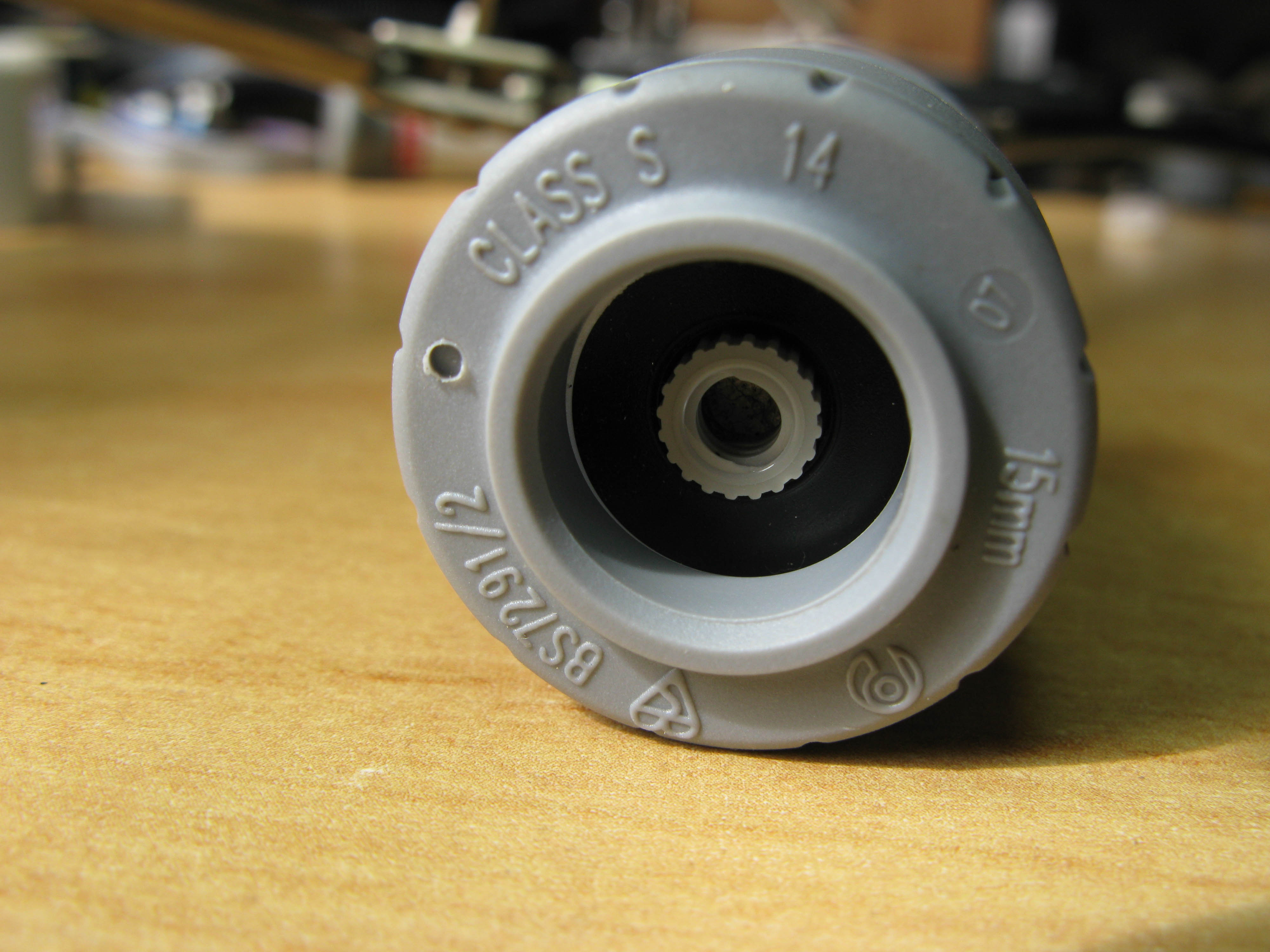 Inserted at end of 15mm straight coupler